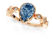 Milgrain Bezel Engagement Ring Setting for Fancy Blue Pear-Shaped Center with Marquise Stations and Bezel Head in Rose Gold