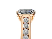 Solitaire Engagement Ring Setting for Emerald Cut Center with Round Cut Channel Band and Prong Head in Rose Gold