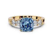 5 Stone Engagement Ring Setting for Fancy Blue Cushion Cut Center with Plain Band and Prong Head in Yellow Gold