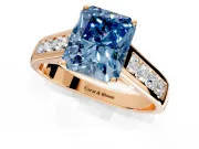 Solitaire Engagement Ring Setting for Fancy Blue Radiant Cut Center with Round Cut Channel Band and Prong Head in Rose Gold