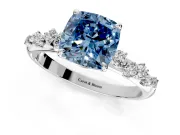 Cluster Engagement Ring Setting for Fancy Blue Cushion Cut Center with Round Cut Accent Band and Prong Head in Platinum