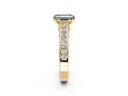 Solitaire Engagement Ring Setting for Fancy Blue Emerald Cut Center with Channel Band and Double Claw Prong Head in Yellow Gold