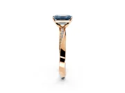Side Accent Engagement Ring Setting for Fancy Blue Emerald Cut Center with Accent Shoulders and Prong Head in Rose Gold