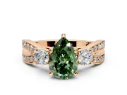 3 Stone Engagement Ring Setting for Fancy Green Pear-Shaped Center with Pave Twist Band and Prong Head in Rose Gold