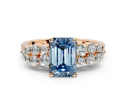 Cluster Engagement Ring Setting for Fancy Blue Emerald Cut Center with 2-Row Shoulder Clusters and Prong Head in Rose Gold