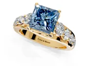 Solitaire Engagement Ring Setting for Fancy Blue Princess Cut Center with Graduated Shared Prongs and Prong Head in Yellow Gold