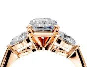 3 Stone Engagement Ring Setting for Radiant Cut Center with Large Pear-Shaped Accents and Prong Head in Rose Gold