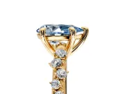 Solitaire Engagement Ring Setting for Fancy Blue Pear-Shaped Center with Trailing Leaf Accent Band and Prong Head in Yellow Gold
