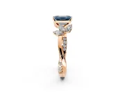 Floral Engagement Ring Setting for Fancy Blue Emerald Cut Center with Trailing Marquise Accents and Prong Head in Rose Gold