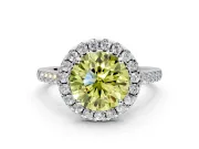 Halo Engagement Ring Setting for Fancy Yellow Round Cut Center with Narrowing Pave Band and Prong Head in Sterling Silver