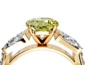 Channel-Set Engagement Ring Setting for Fancy Yellow Round Cut Center with Baguette Band and Prong Head in Yellow Gold