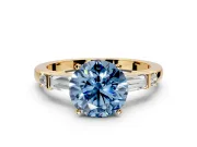 Bar-Set Engagement Ring Setting for Fancy Blue Round Cut Center with Tapered Baguette Accents and Prong Head in Yellow Gold