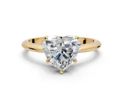 Solitaire Engagement Ring Setting for Heart-Shaped Center with Knife Ridge Band and Claw Prong Head in Yellow Gold