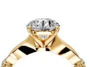 Solitaire Engagement Ring Setting for Round Cut Center with Carved Leaf Shoulders and Prong Head in Yellow Gold