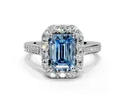 Floral Halo Engagement Ring Setting for Fancy Blue Emerald Cut Center with Large Halo Accents and Prong Head in Platinum