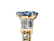 Channel-Set Engagement Ring Setting for Fancy Blue Pear-Shaped Center with Baguette Band and Prong Head in Yellow Gold