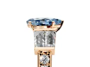 Channel-Set Engagement Ring Setting for Fancy Blue Pear-Shaped Center with Baguette Band and Prong Head in Rose Gold