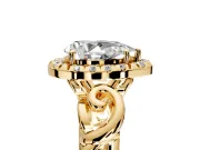 Halo Engagement Ring Setting for Pear-Shaped Center with Open Scroll Shoulders and Prong Head in Yellow Gold