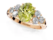 Cluster Engagement Ring Setting for Fancy Yellow Oval Center with Round Cut Accent Frame and Prong Head in Rose Gold