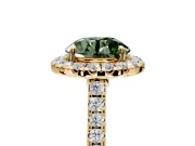 Halo Engagement Ring Setting for Fancy Green Round Cut Center with Narrowing Pave Band and Prong Head in Yellow Gold
