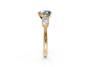 3 Stone Engagement Ring Setting for Fancy Blue Heart-Shaped Center with Large Pear-Shaped Accents and Prong Head in Yellow Gold