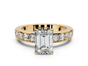 Solitaire Engagement Ring Setting for Emerald Cut Center with Channel-Set Accents and Prong Head in Yellow Gold