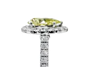 Halo Engagement Ring Setting for Fancy Yellow Pear-Shaped Center with Narrowing Pave Band and Prong Head in White Gold