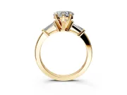 3 Stone Engagement Ring Setting for Heart-Shaped Center with Channel Baguette Accents and Prong Head in Yellow Gold