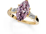 3 Stone Engagement Ring Setting for Fancy Pink Marquise Center with Channel Baguette Accents and Prong Head in Yellow Gold