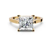 Solitaire Engagement Ring Setting for Princess Cut Center with Tapered Shoulders and Prong Head in Yellow Gold