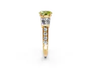 Channel-Set Engagement Ring Setting for Fancy Yellow Round Cut Center with Baguette Band and Prong Head in Yellow Gold