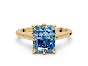 Solitaire Engagement Ring Setting for Fancy Blue Radiant Cut Center with Cathedral Band and Prong Head in Yellow Gold