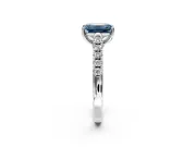 Solitaire Engagement Ring Setting for Fancy Blue Emerald Cut Center with Partway Pave Band and Prong Head in Platinum