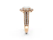 Large Accent Halo Engagement Ring Setting for Emerald Cut Center with Pave Split Shank and Prong Head in Rose Gold