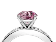 Solitaire Engagement Ring Setting for Fancy Pink Round Cut Center with Channel-Set Accents and Prong Head in White Gold