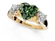 3 Stone Engagement Ring Setting for Fancy Green Heart-Shaped Center with Raised Basket Heads and Prong Head in Yellow Gold