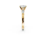 3 Stone Engagement Ring Setting for Princess Cut Center with Channel Baguette Accents and Prong Head in Yellow Gold