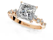Cluster Engagement Ring Setting for Princess Cut Center with Round Cut Accent Band and Prong Head in Rose Gold