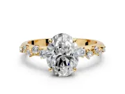 Cluster Engagement Ring Setting for Oval Center with Round Cut Accent Band and Prong Head in Yellow Gold
