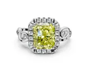 Halo Engagement Ring Setting for Fancy Yellow Radiant Cut Center with Open Scroll Shoulders and Prong Head in Platinum