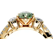 3 Stone Engagement Ring Setting for Fancy Green Pear-Shaped Center with Pave Split Shank and Prong Head in Yellow Gold