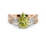 3 Stone Engagement Ring Setting for Fancy Yellow Pear-Shaped Center with Pave Twist Band and Prong Head in Rose Gold