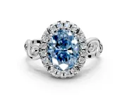 Halo Engagement Ring Setting for Fancy Blue Oval Center with Open Scroll Shoulders and Prong Head in Platinum
