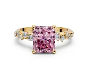 Solitaire Engagement Ring Setting for Fancy Pink Radiant Cut Center with Trailing Leaf Accent Band and Prong Head in Yellow Gold