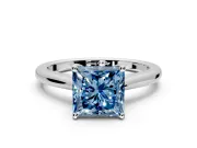 Solitaire Engagement Ring Setting for Fancy Blue Princess Cut Center with Narrow Cathedral Band and Prong Head in White Gold