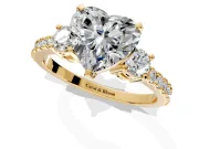 3 Stone Engagement Ring Setting for Heart-Shaped Center with Round Cut Side Accents and Prong Head in Yellow Gold