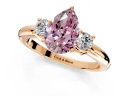 3 Stone Engagement Ring Setting for Fancy Pink Pear-Shaped Center with Wide Plain Band and Prong Head in Rose Gold
