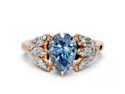 Leaf Cluster Engagement Ring Setting for Fancy Blue Pear-Shaped Center with Marquise Accents and Prong Head in Rose Gold