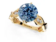 Solitaire Engagement Ring Setting for Fancy Blue Round Cut Center with Accented Twist Band and Leaf Prong Head in Yellow Gold