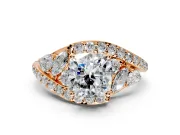 Halo Engagement Ring Setting for Cushion Cut Center with Marquise and Pave Bypass Band and Prong Head in Rose Gold